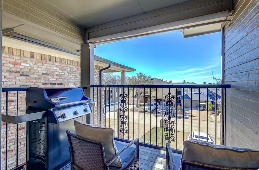 Covered patio with grill, with lake views