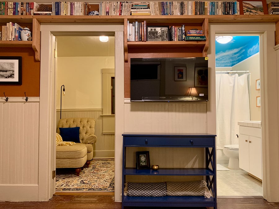 The view from the living room sofa, to the bonus and bath rooms. The bedroom is just to the right of this.