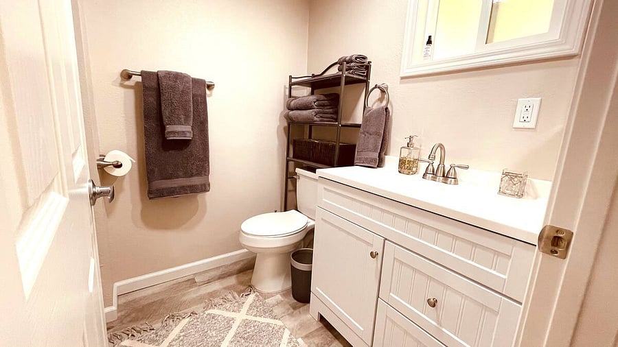 The second bathroom boasts ENDLESS hotwater, a bathtub/shower combo, new linens, new fixtures, and amenities. 