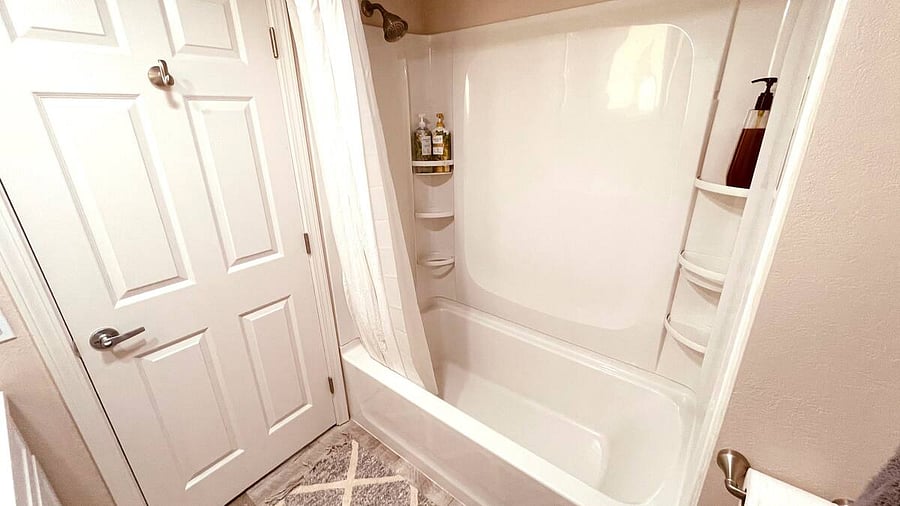The second bathroom boasts ENDLESS hotwater, a bathtub/shower combo, new linens, new fixtures, and amenities. 