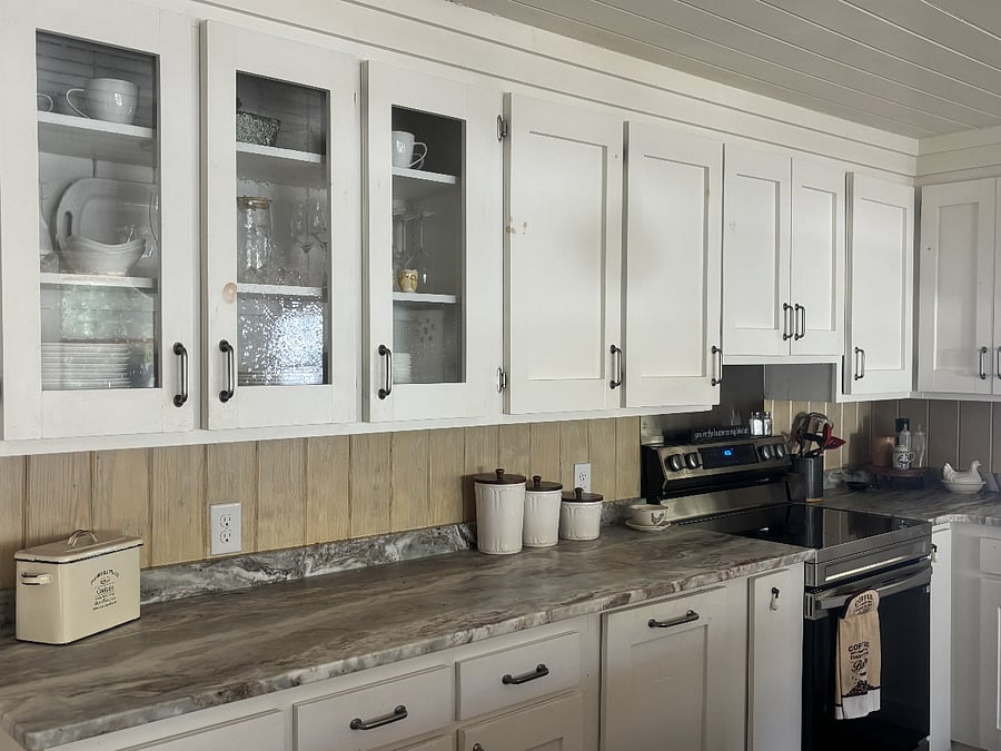 Plenty of cabinet space and filled with everything you need to live comfortably.