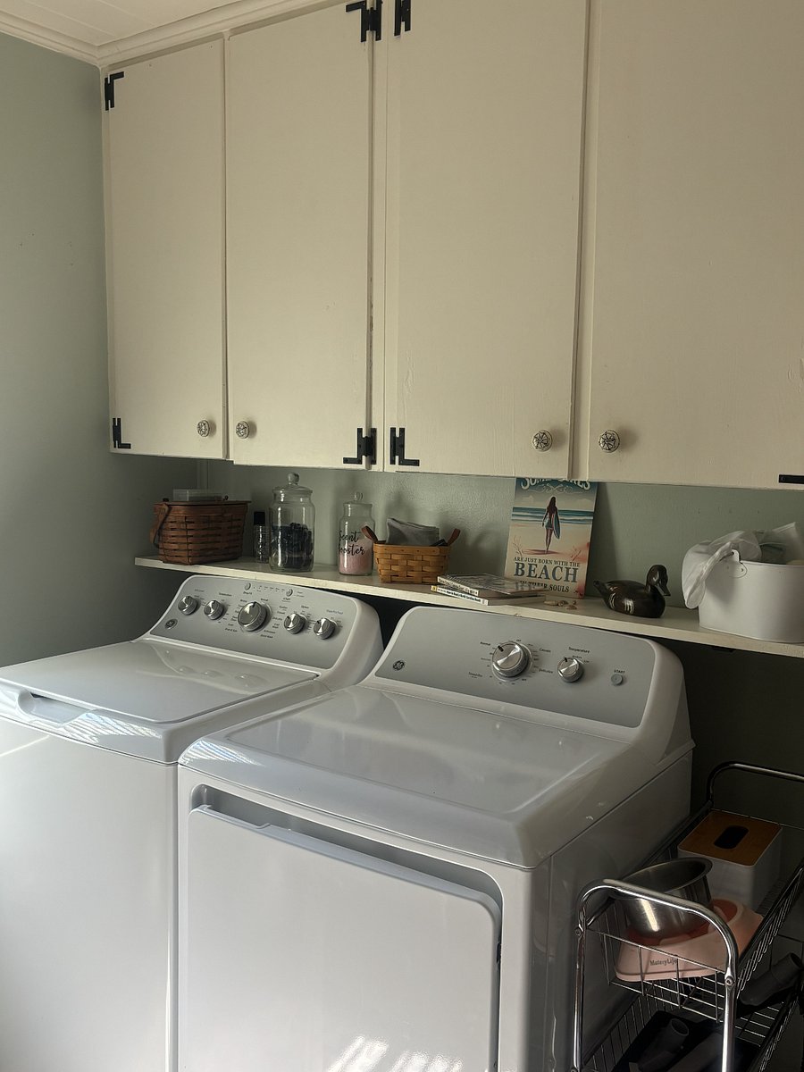 Washer and gas dryer are located in the walk in pantry next to the kitchen, where there is also plenty of storage for kitchen appliances and food items.