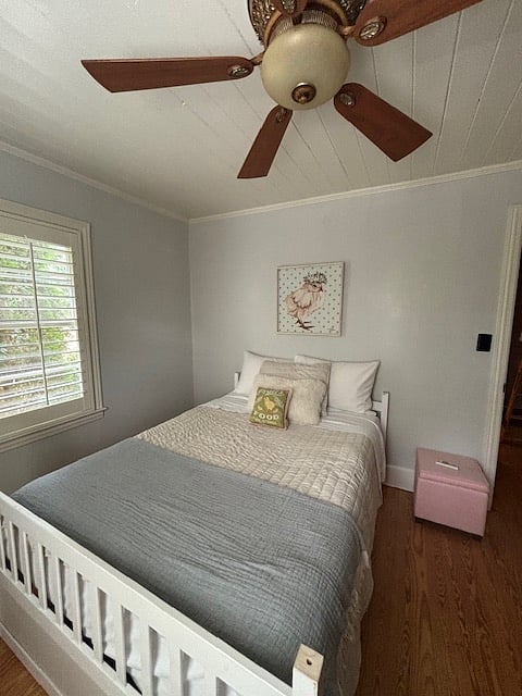 The second bedroom features a full size bed with twin trundle underneath, closet with built in dividers and it can also double as a hidden desk.