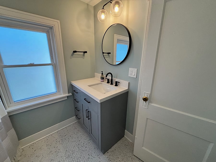 Get ready with the benefit of natural light from the new window (with privacy film).
