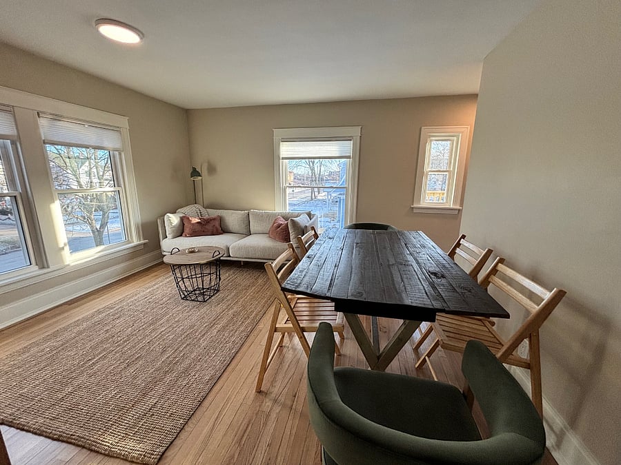 Dining table folds out to seat 6.