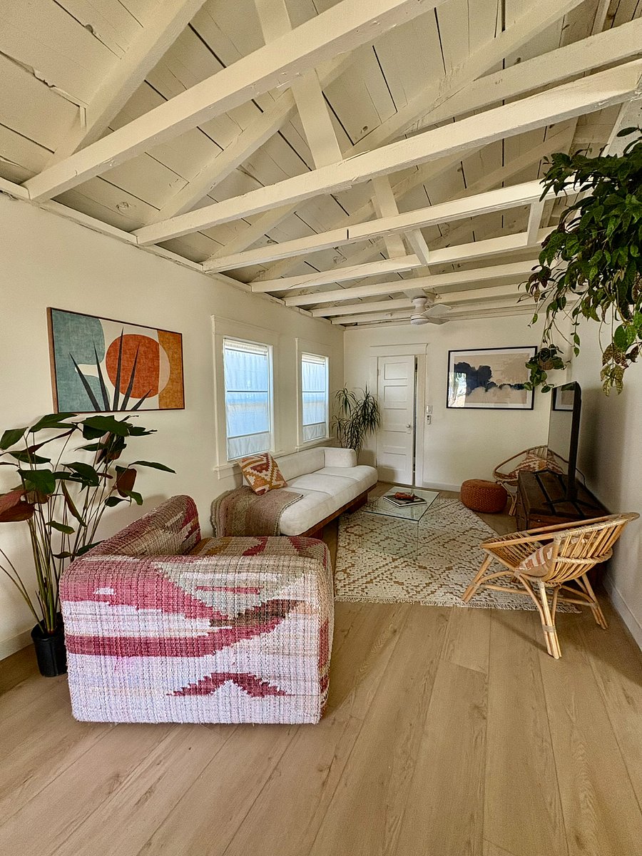 A collection of hand-picked furnitureincluding pieces from Article, Anthropologie, CB2, Design Within Reach, Scandinavian Designs, and genuine restored mid-century findscreates a refined, timeless atmosphere. Nothing here is generic; every element was intentionally selected.