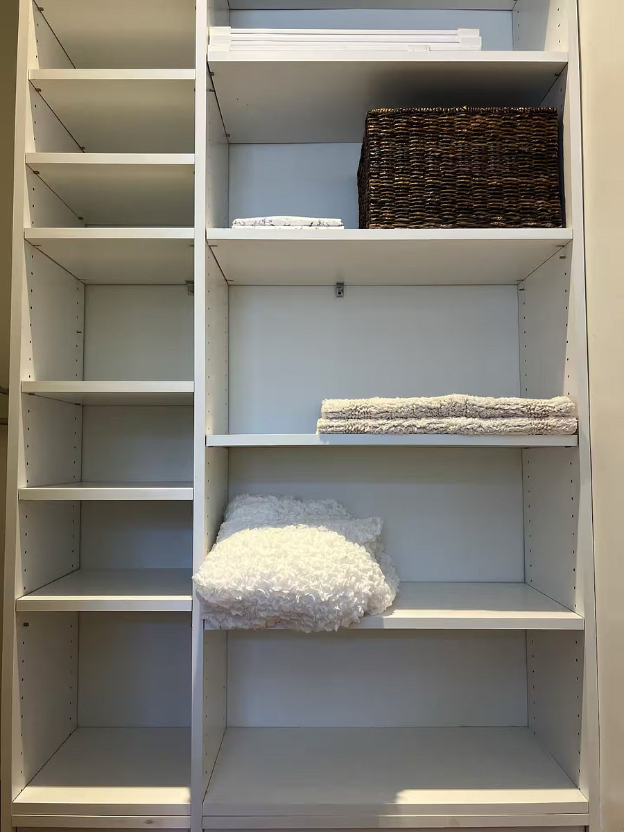 A small closet. Plenty of room for belongings. 