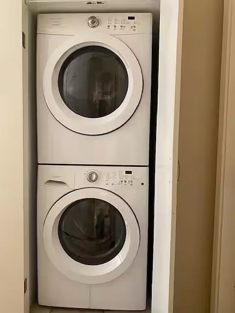 Washer & Dryer, just outside the room and free to use.