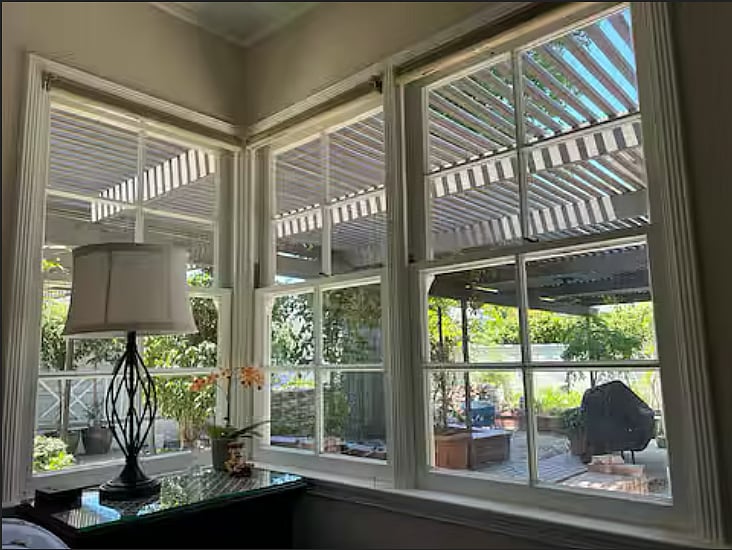The room overlooks a beautiful garden