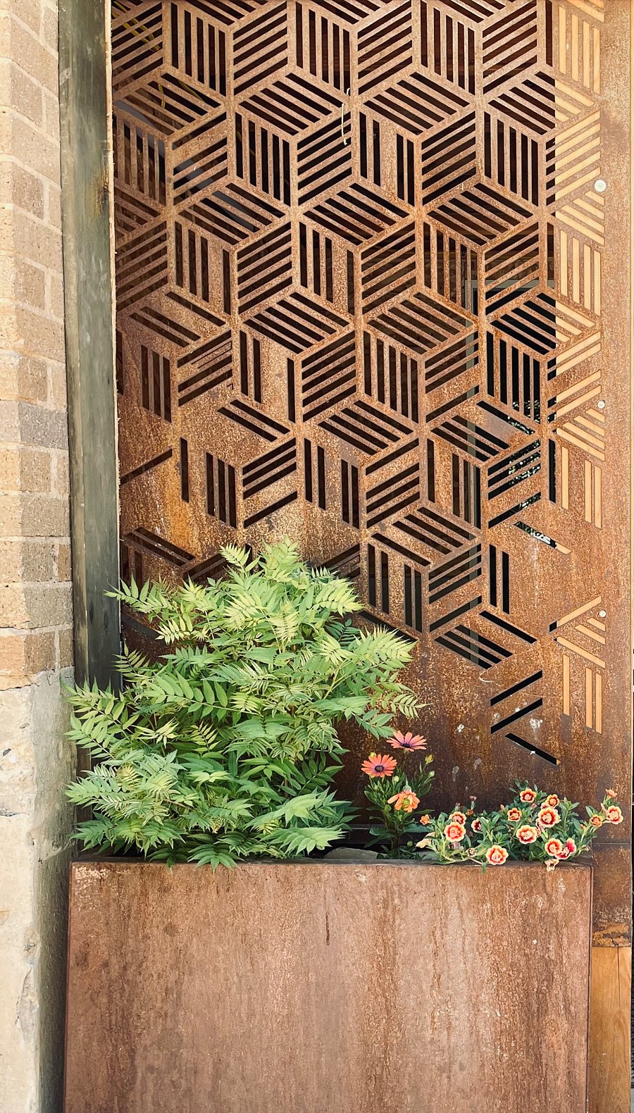 metal privacy screen to private entry and porch.