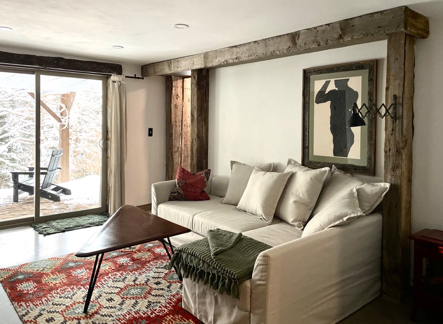 another view of your living area and private stone porch that overlooks the wildlife meadow.