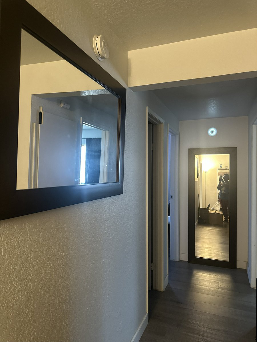 Motion sensor light in Hallway with mirrors