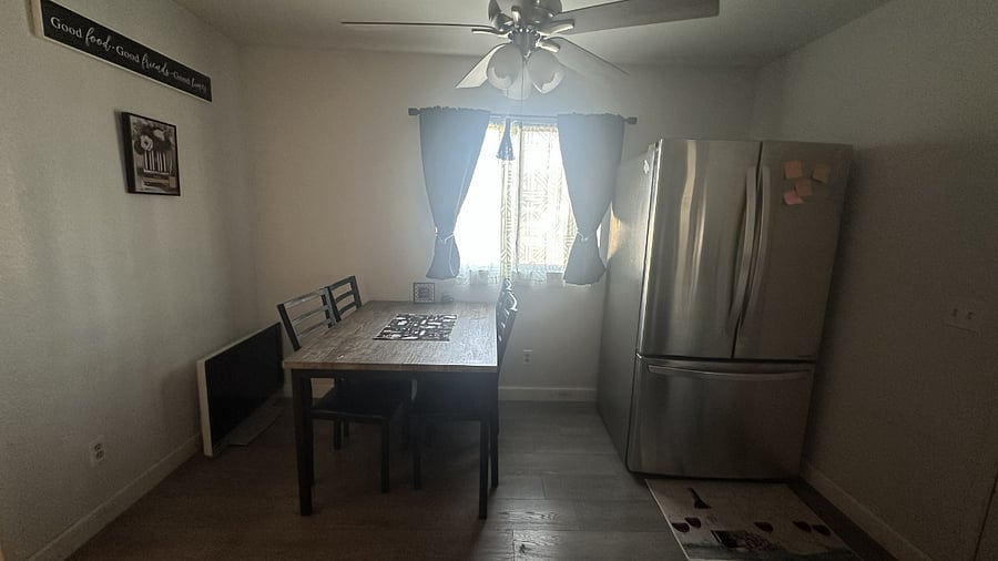 Spacious eat-in Kitchen with stainless steel refrigerator