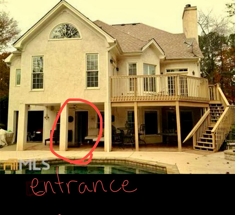 The rear view of our home, showing where the private entrance to Garden-Level apartment is located. 