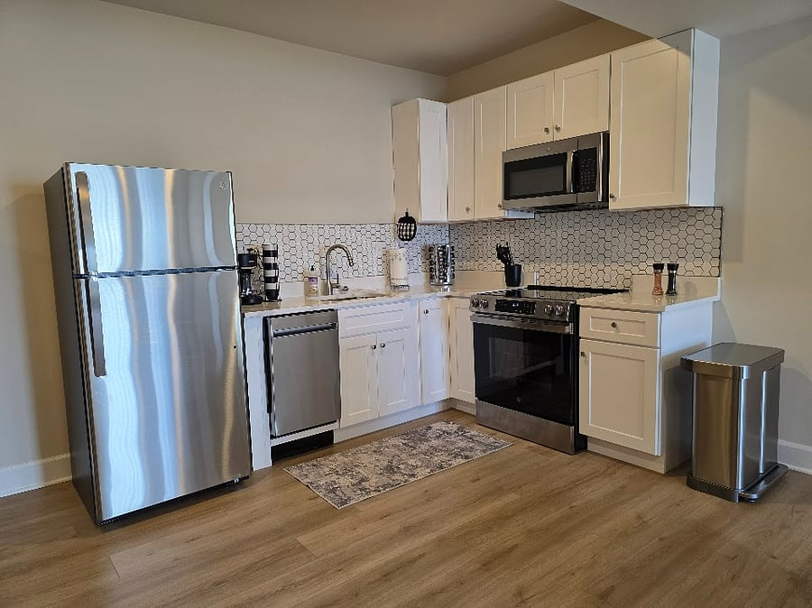 Kitchenette offers soft close cabinets and quiet appliances
