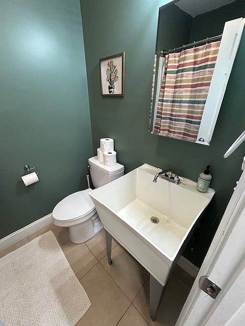 Full bathroom with utility sink