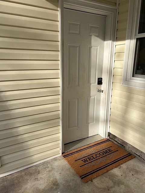 Entrance to guest suite with coded entry. 