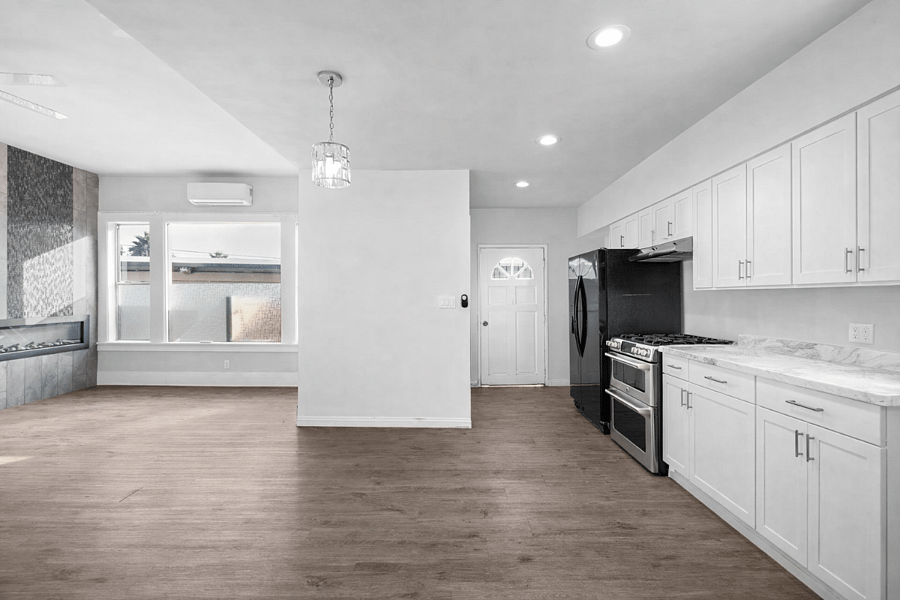 Double-sided fireplace in dining room & kitchen.