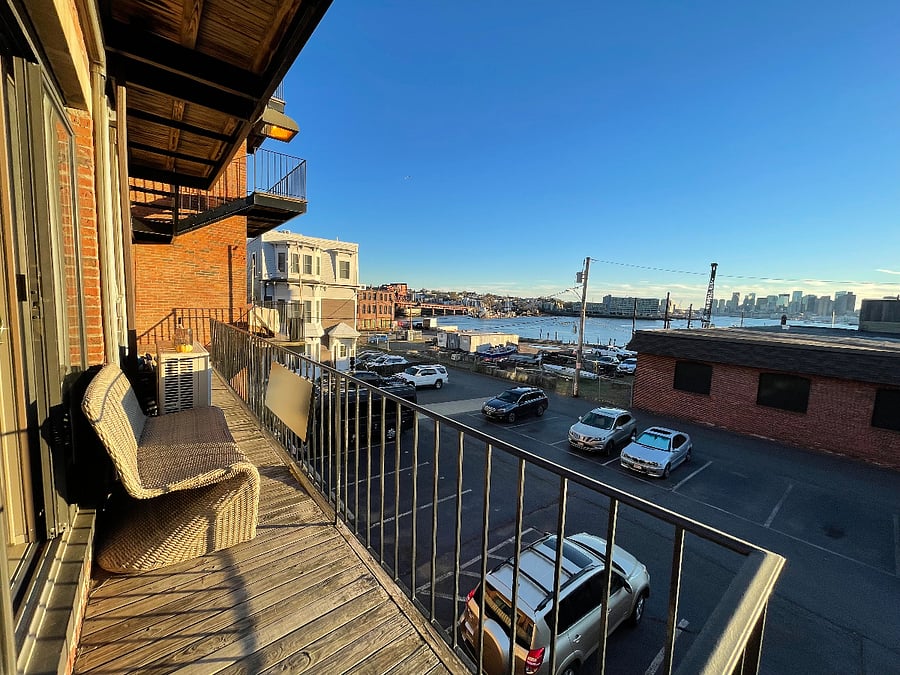 Private waterfront deck and skyline view