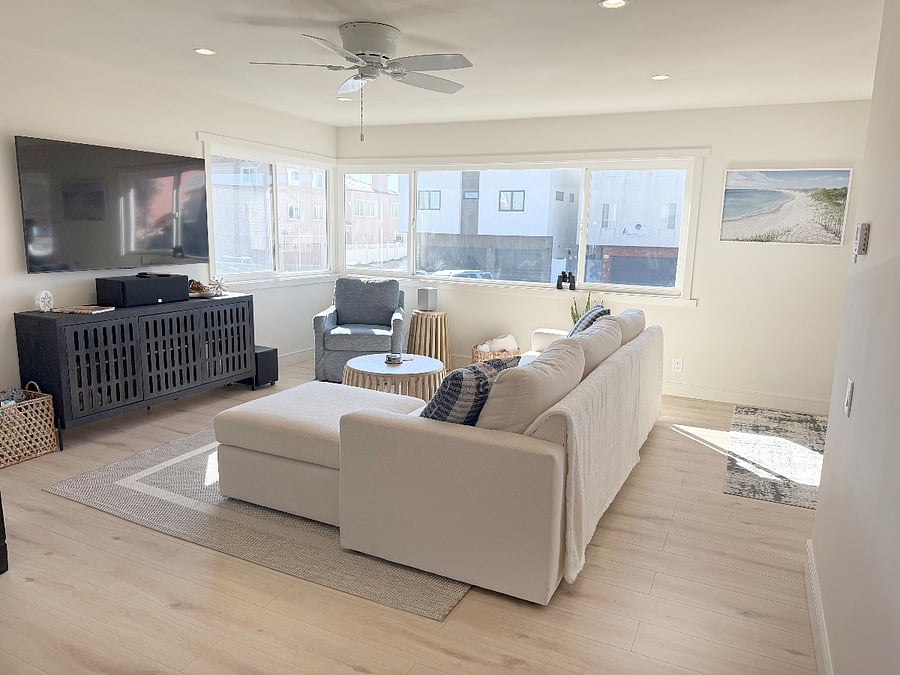Light and bright living room with peek-a-boo ocean views