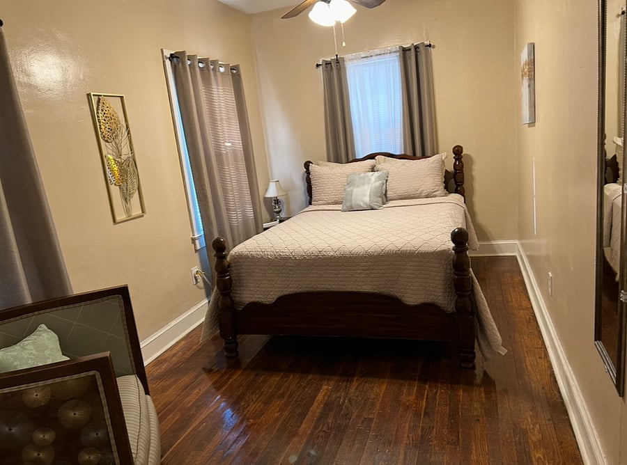 Bedroom #1 with queen size bed and closet.