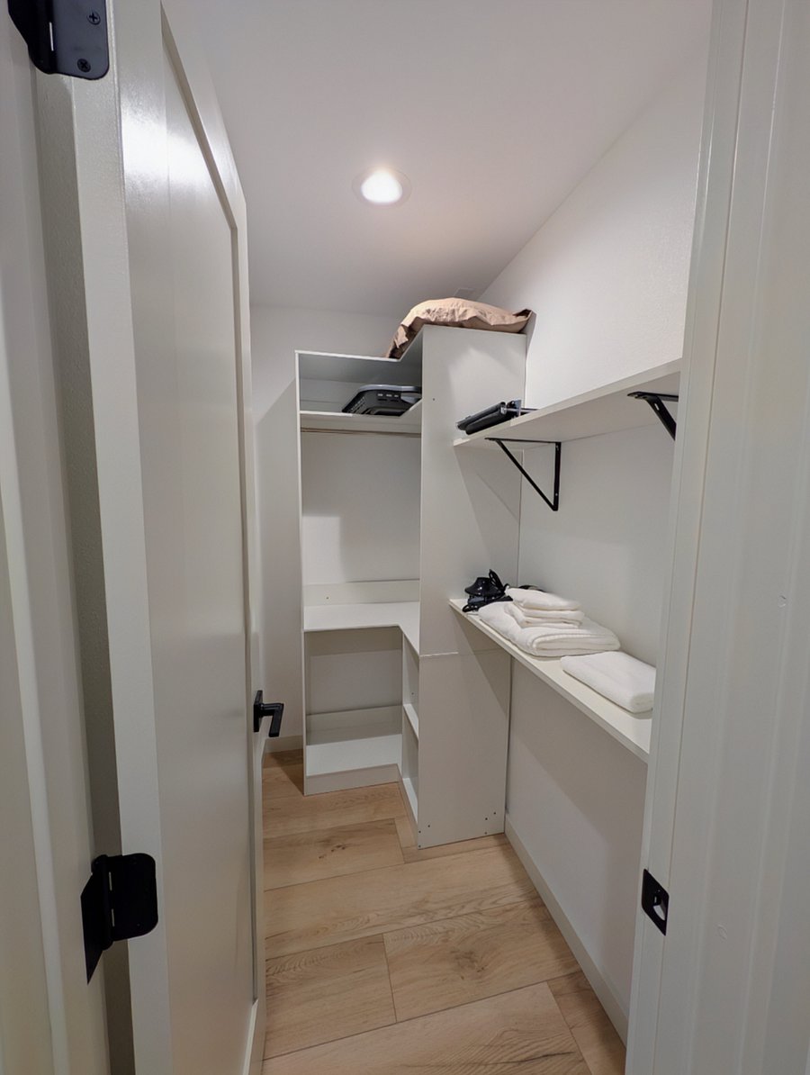 Additional closet, walk-in with built-in wardrobe and storage shelves