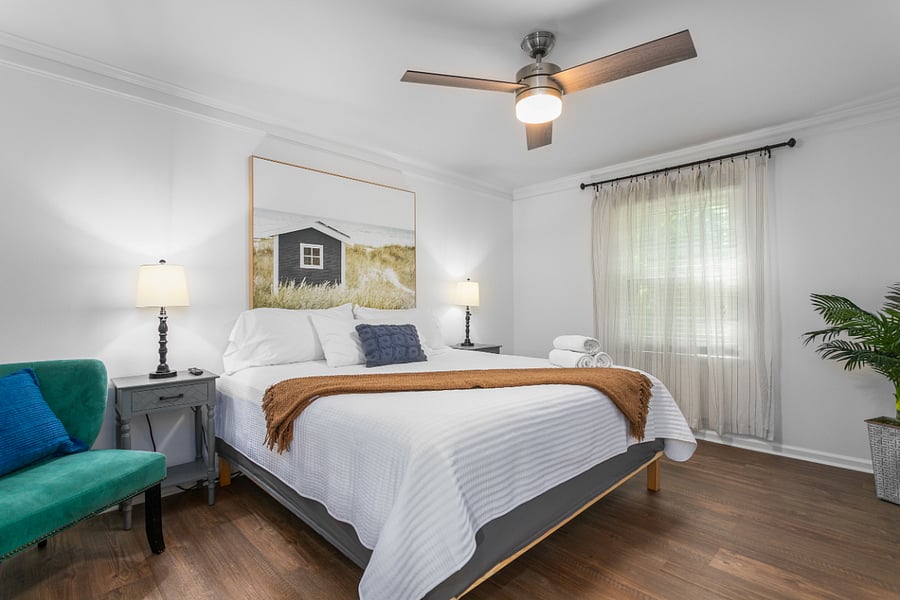 Bedroom 1: Private main-level primary suite featuring a King size bed.