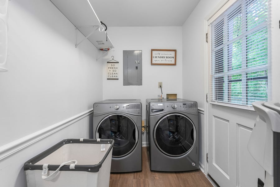 Laundry room located on the main floor past the kitchen area.