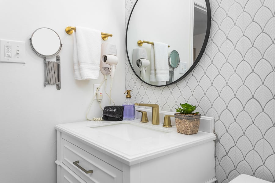 Full Size Bathroom connecting with Bedrooms 2 and 3, and cam be shared with Bedroom 4.

Hair dryer and mirror included