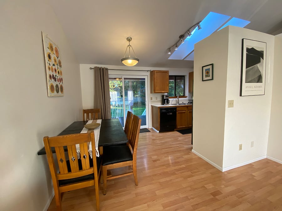Open floor plan means that living room opens right to dining area opens right to kitchen.