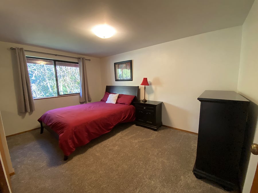 Queen size bed; new carpet; blackout curtains.