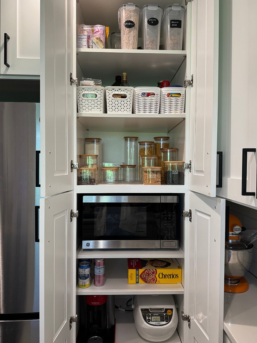 Tons of cabinet storage, fully stocked kitchen
