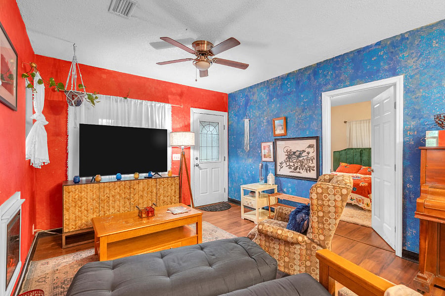 Spacious Living room with Roku TV, Full Size Futon, Electric Fireplace, Ceiling Fan