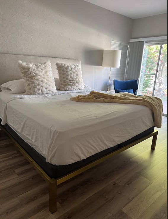Guest bedroom with backyard access.