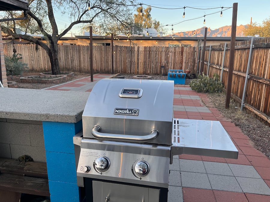 Large outdoor area includes grill and fire pit!