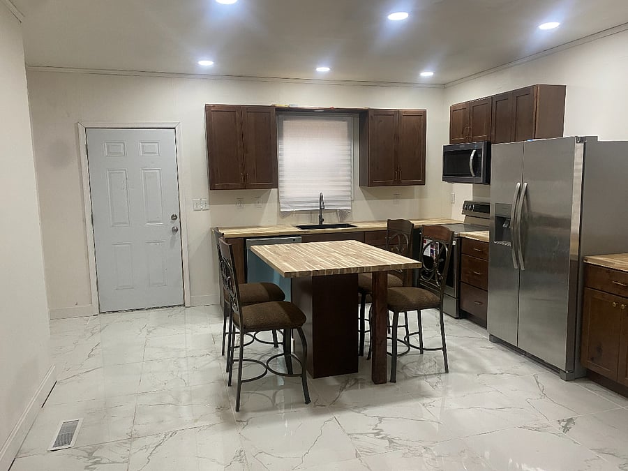 modern kitchen with plenty of storage and island