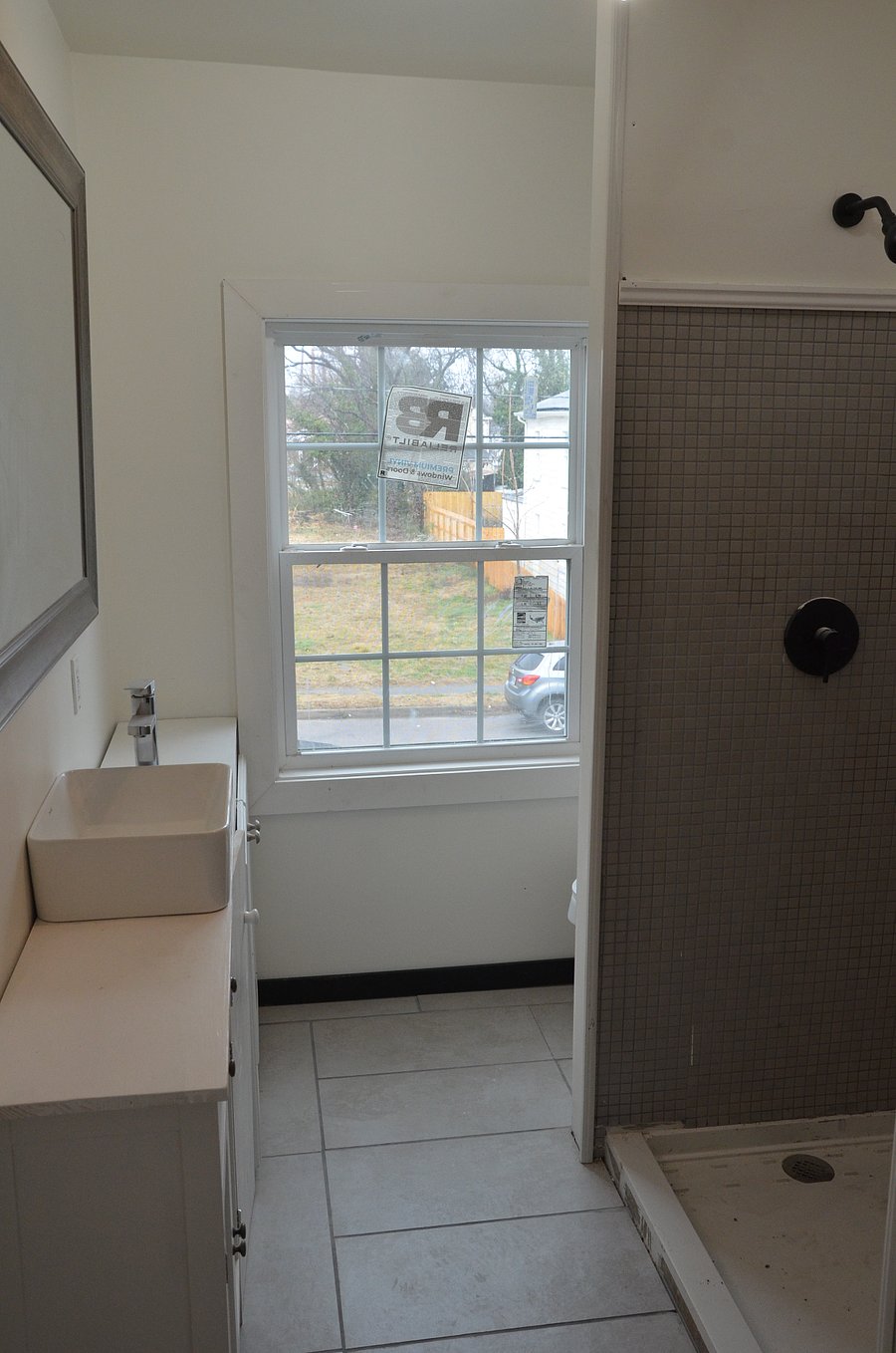 upstairs full bathroom with farmhouse sink, large mirror and plenty of storage