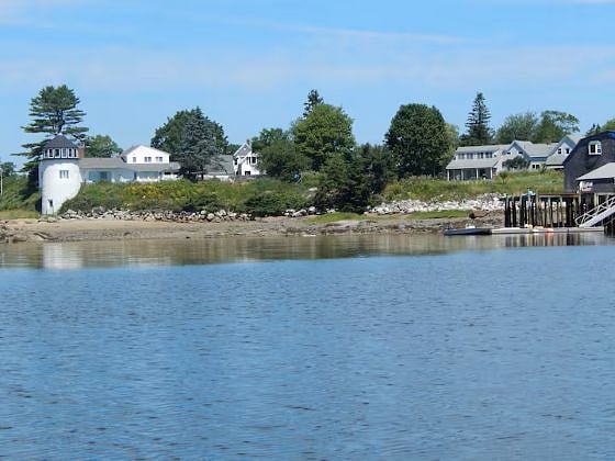 View of house and neighbors from water