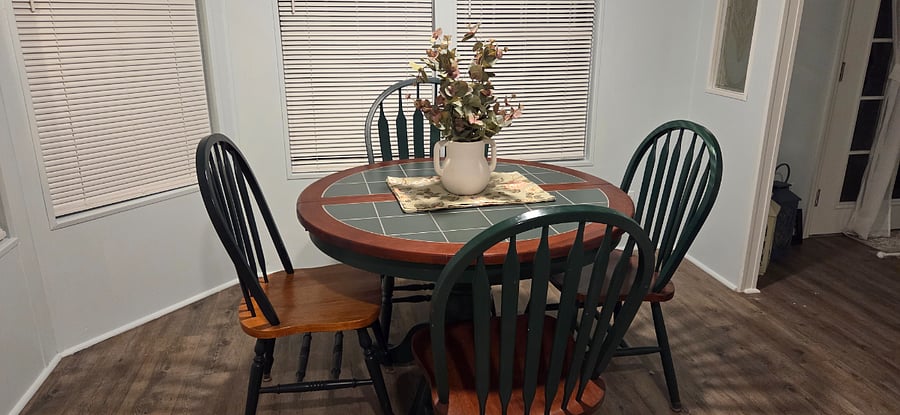Dining room.  Table expands to an oval to accommodate more guests.