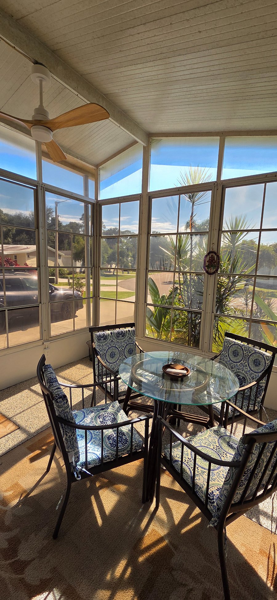 Screened sunroom with fan.  Enjoy outdoor dining all year long.