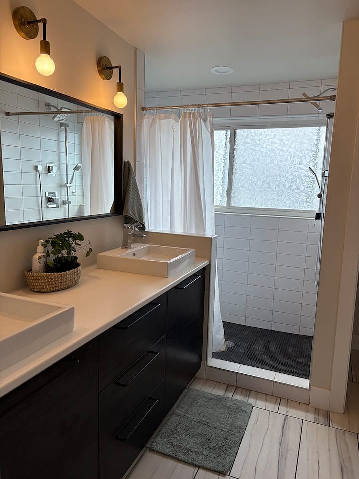 Master bathroom with shower and stand alone tub