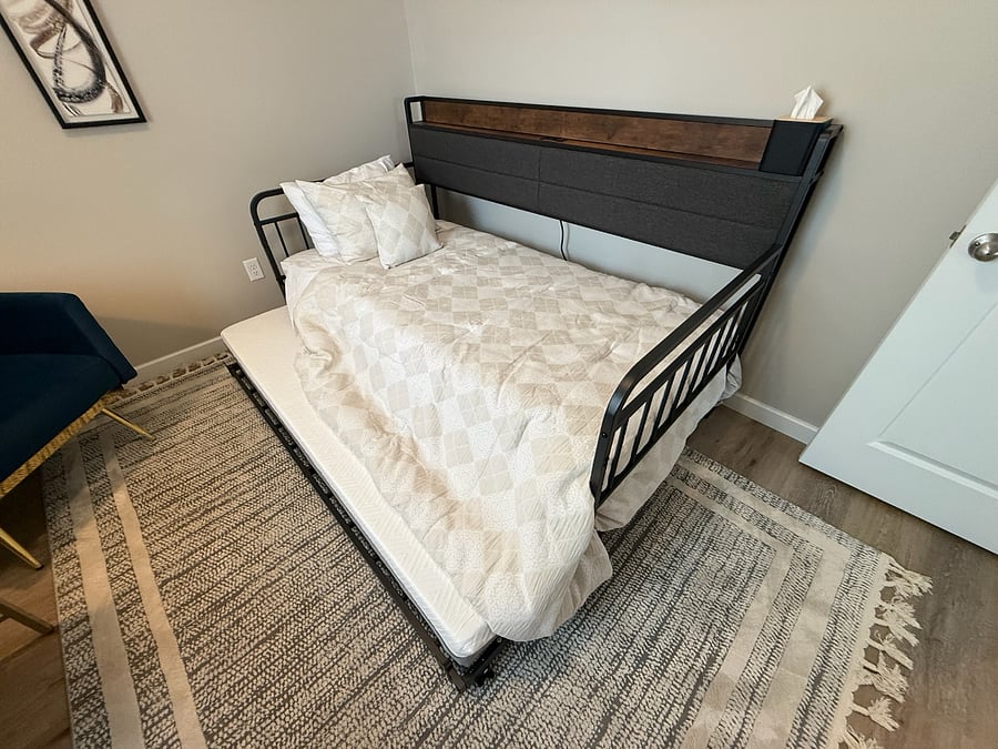 Versatile third bedroom set up as a private office + guest room. Features a comfortable twin Xl bed with pull out bed under. Fresh sheets, comforter, and pillows stored in the closet for the pull-out. Large desk which is perfect for charting, remote work, or studying. Closet with hangers, shelving, and an extra warm blanket!
