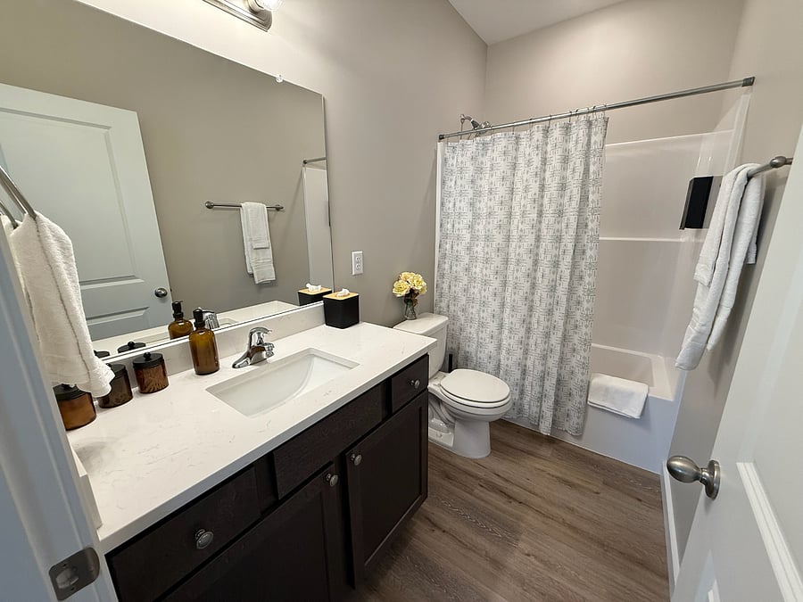 Private attached master bathroom with walk-in shower, and plenty of counter space + storage. Fully stocked for your stay:
  towels & washcloths
  Shampoo, conditioner, body wash, hand soap
  Hair dryer
  Toilet paper, tissues, makeup remover towels
  Cleaning essentials (toilet brush, plunger, disinfectants, paper towels, trash bags)