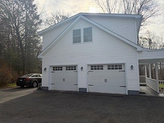 2nd floor apt, parking space on left, covered porch entry on right