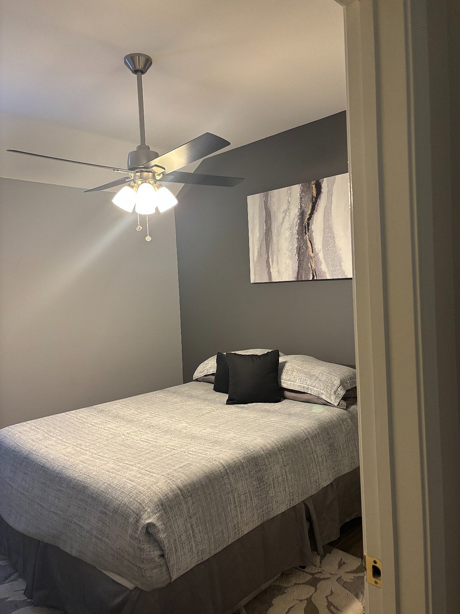 Second bedroom, queen size bed, fireplace, with walk-in closet