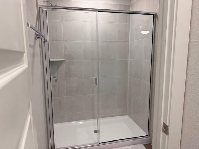 Primary bathroom private walk-in shower.