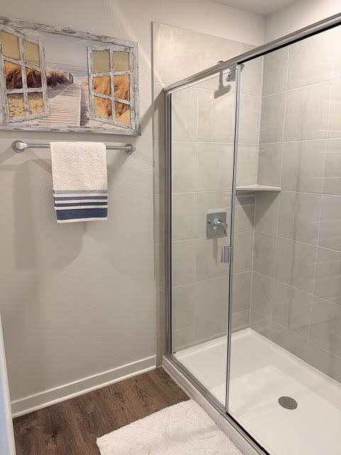 Primary bathroom Walk-in Shower, double vanity, and a spacious carpeted floor walk-in closet.