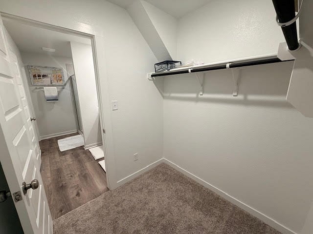 Primary bedroom walk-in closet