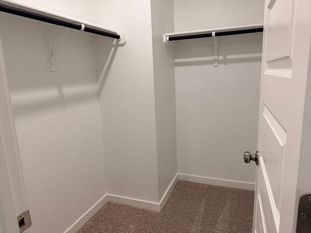 attached private, full bathroom with the ensuite bedroom or 2nd primary bedroom with a bathroom inside the room and a walk-in closet