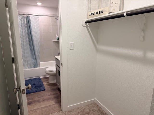 attached private, full bathroom with the ensuite bedroom or 2nd primary bedroom with a bathroom inside the room and a walk-in closet